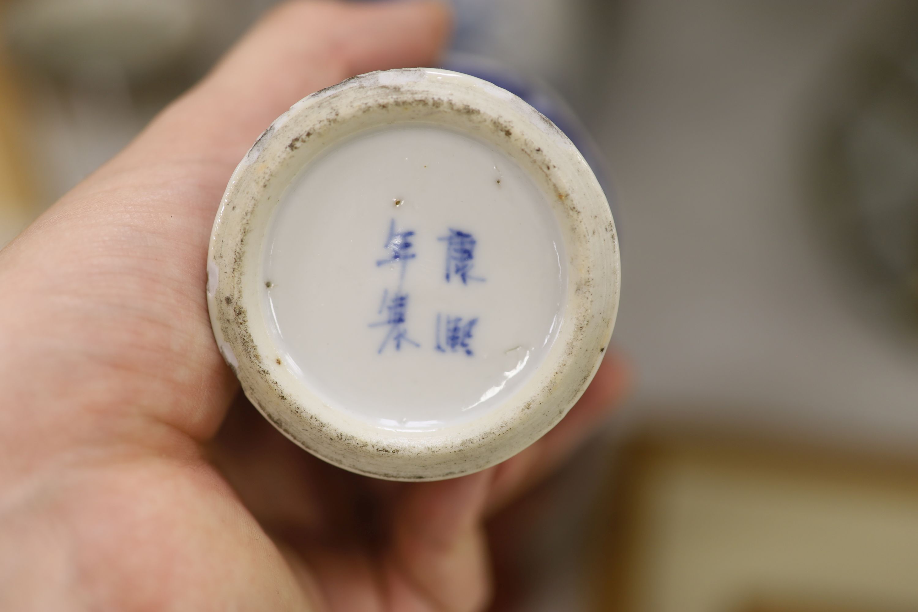 Three Chinese blue and white vases, a cloisonne enamel vase, another vase and a soapstone figure